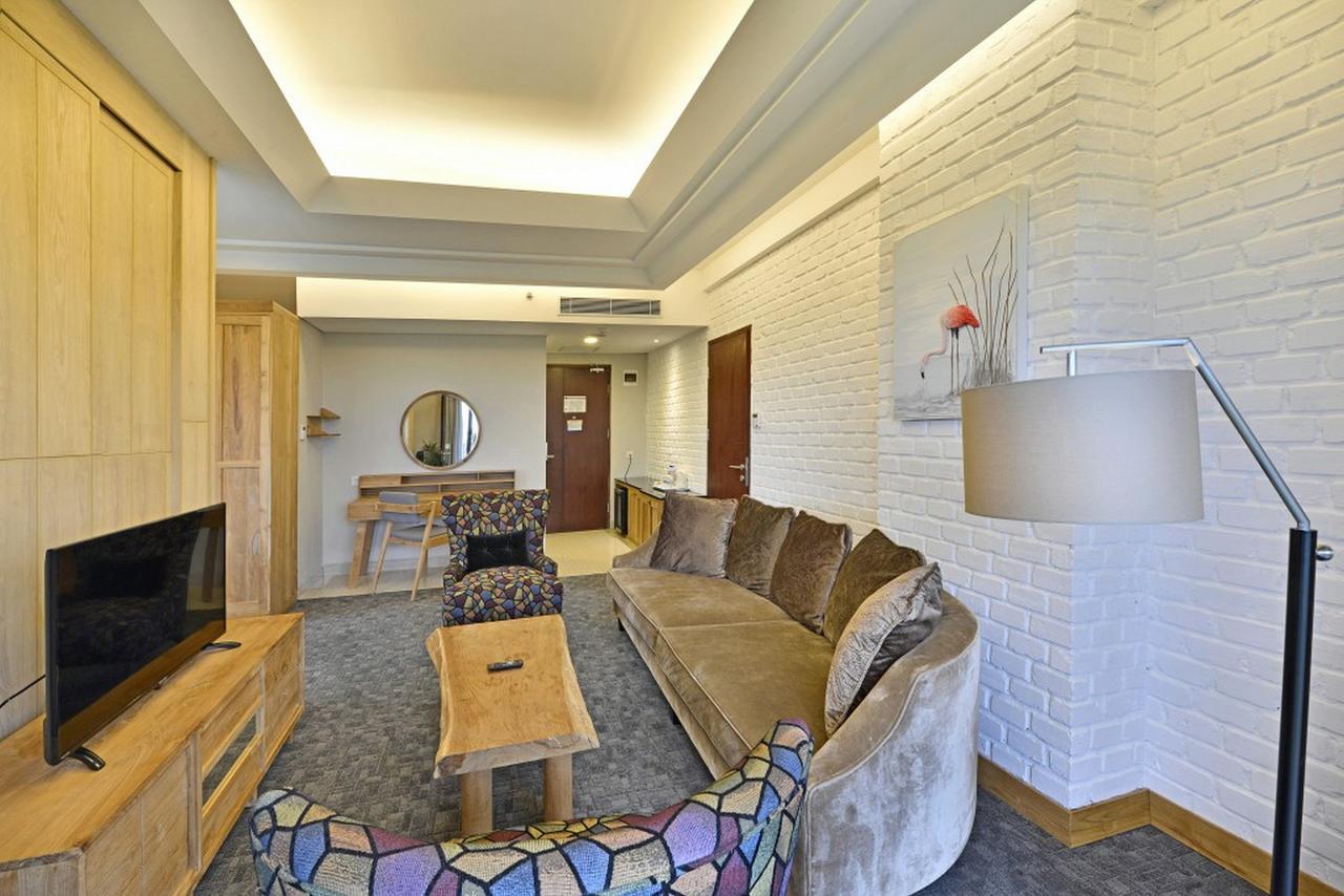 Famvida Hotel Lubuklinggau Rum bild